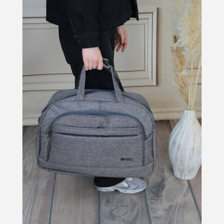 ساک دستی پارچه ای اسپرت و رسمی با بند بلند و سه جیب بیرونی ابعاد 54 در 45 در 8 سانتیمتر